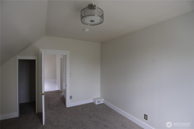 422 Chenault Ave, Hoquiam, WA 98550 - interior space with dark carpet, baseboards, lofted ceiling, and visible vents