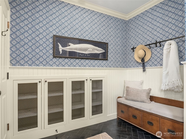 mudroom with crown molding and wallpapered walls