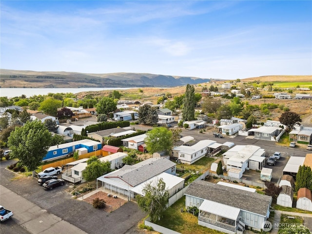 aerial perspective of suburban area featuring a mountain backdrop