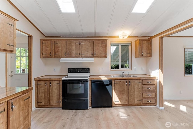 kitchen with black dishwasher, electric range, a sink, under cabinet range hood, and brown cabinets