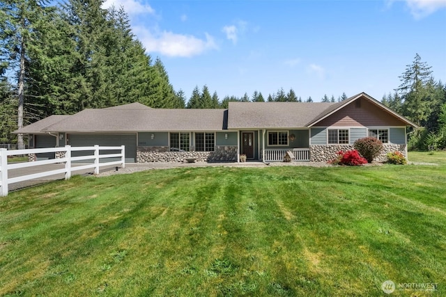 12430 Brooks St SW, Olympia, WA 98512 - ranch-style home with a porch, fence, a front yard, and a garage