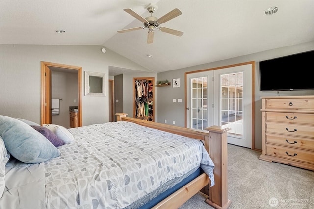 12430 Brooks St SW, Olympia, WA 98512 - bedroom featuring a closet, lofted ceiling, a walk in closet, access to outside, and light colored carpet