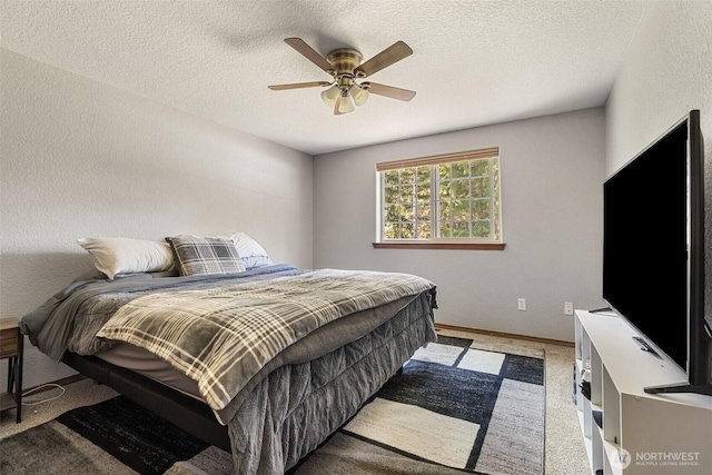 12430 Brooks St SW, Olympia, WA 98512 - bedroom with baseboards, a ceiling fan, a textured ceiling, and light colored carpet