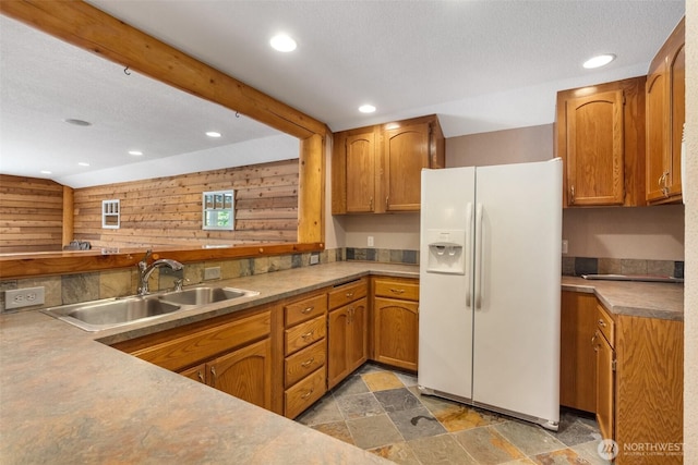 12430 Brooks St SW, Olympia, WA 98512 - kitchen with a sink, stone finish floor, white refrigerator with ice dispenser, and recessed lighting