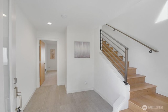 3236 W Government Way, Seattle, WA 98199 - staircase featuring recessed lighting and baseboards