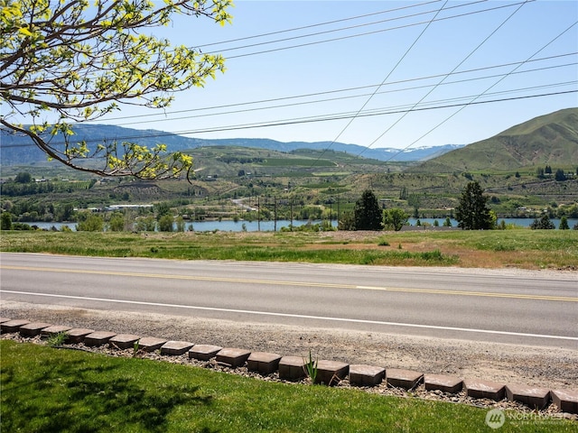 mountain view featuring a water view