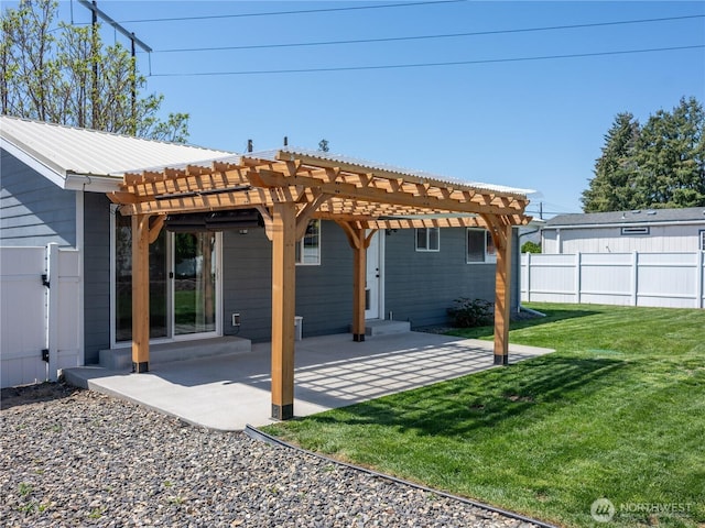 rear view of house featuring a patio, a yard, fence, and a pergola