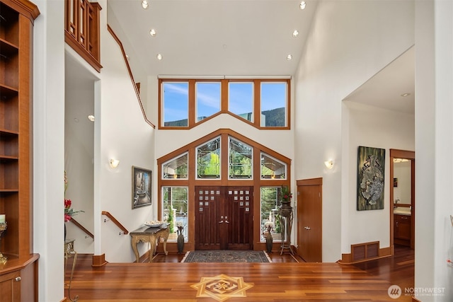 15803 Uplands Way SE, North Bend, WA 98045 - entryway featuring a towering ceiling and wood finished floors