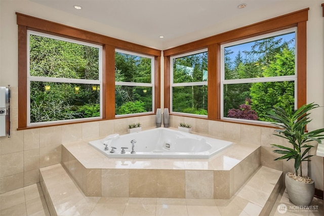 15803 Uplands Way SE, North Bend, WA 98045 - full bathroom with a whirlpool tub, plenty of natural light, and tile patterned flooring
