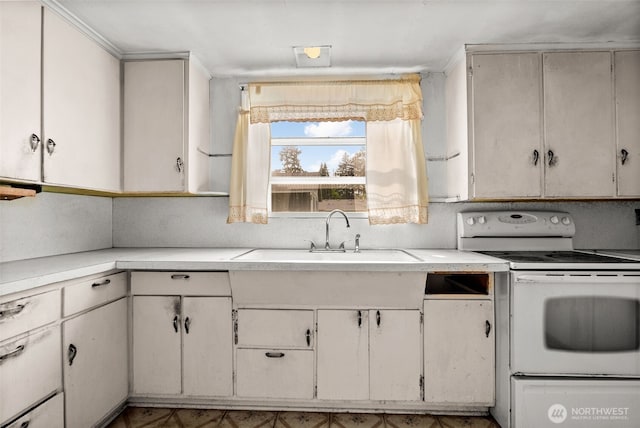 kitchen featuring white electric range oven, a sink, light countertops, and crown molding