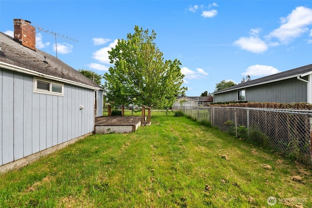 view of yard with a deck