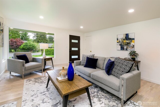 18733 50th Ave NE, Lake Forest Park, WA 98155 - living room with light wood finished floors, recessed lighting, and baseboards