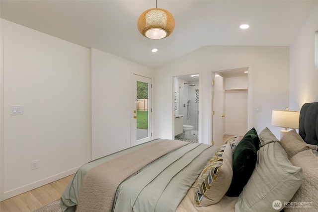 18733 50th Ave NE, Lake Forest Park, WA 98155 - bedroom with light wood finished floors, lofted ceiling, baseboards, ensuite bathroom, and a walk in closet