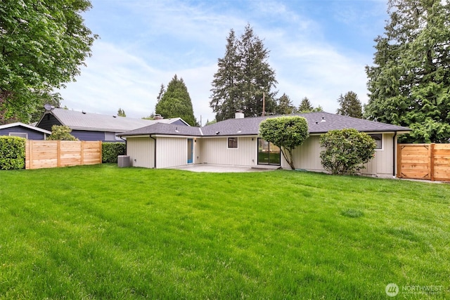 18733 50th Ave NE, Lake Forest Park, WA 98155 - back of property featuring a patio area, a chimney, and a shingled roof