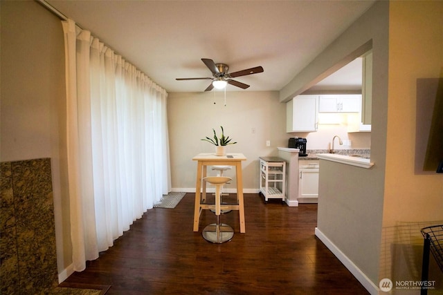 34012 1st Pl S # J, Federal Way, WA 98003 - dining space with baseboards, dark wood-style flooring, and ceiling fan