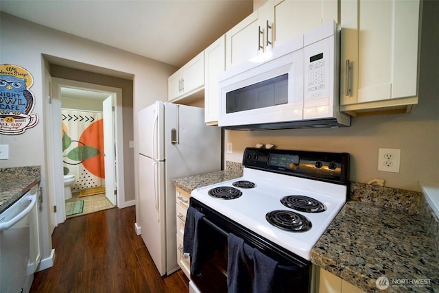 34012 1st Pl S # J, Federal Way, WA 98003 - kitchen featuring stone countertops, white appliances, dark wood-style floors, and white cabinetry