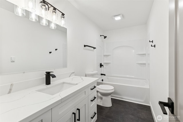 full bathroom featuring toilet, shower / washtub combination, and vanity