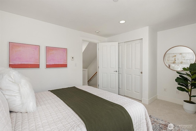 bedroom featuring baseboards, a closet, recessed lighting, and carpet floors