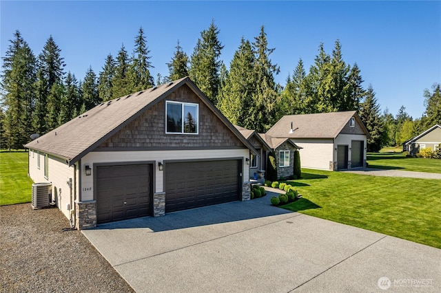 craftsman inspired home featuring a front yard, central AC unit, and stone siding