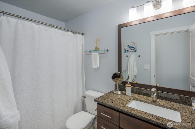 full bath with vanity and toilet