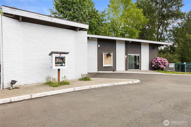 15713 81st St E Unit 135, Puyallup, WA 98372 - view of front of house with brick siding