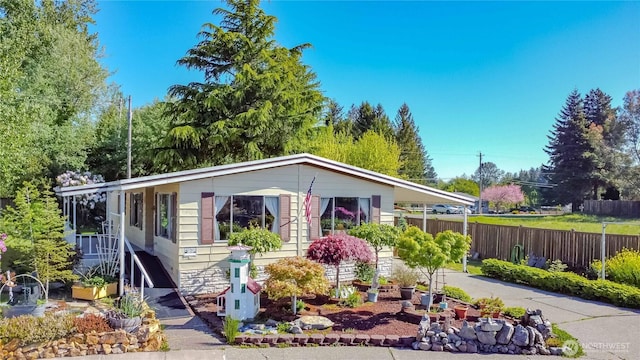 view of front of property with fence
