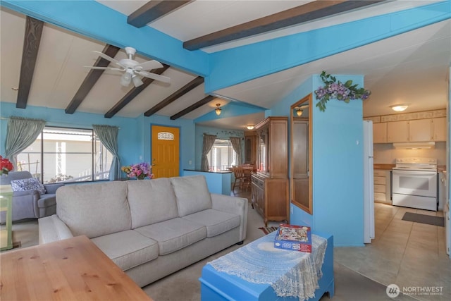 living area featuring tile patterned floors, a wealth of natural light, lofted ceiling with beams, and ceiling fan