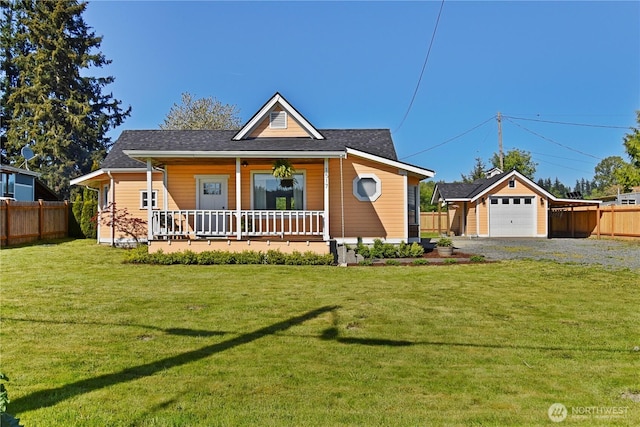 1517 Pioneer Hwy, Silvana, WA 98287 - bungalow-style home featuring fence, a front yard, an outbuilding, covered porch, and gravel driveway