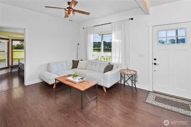 1517 Pioneer Hwy, Silvana, WA 98287 - living room featuring baseboards, ceiling fan, wood finished floors, and beam ceiling