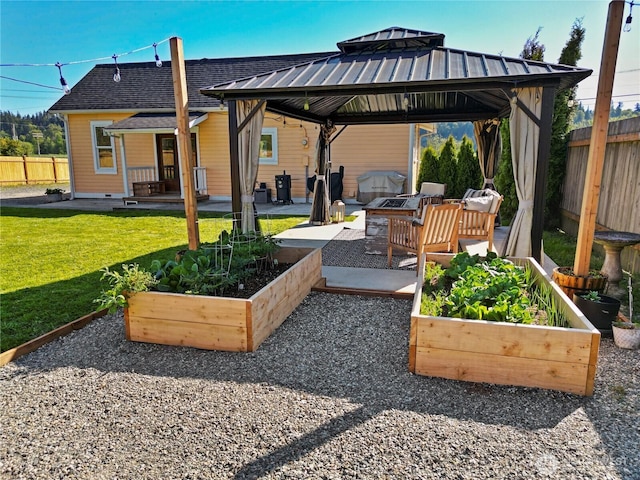 1517 Pioneer Hwy, Silvana, WA 98287 - exterior space featuring fence, a gazebo, and a vegetable garden
