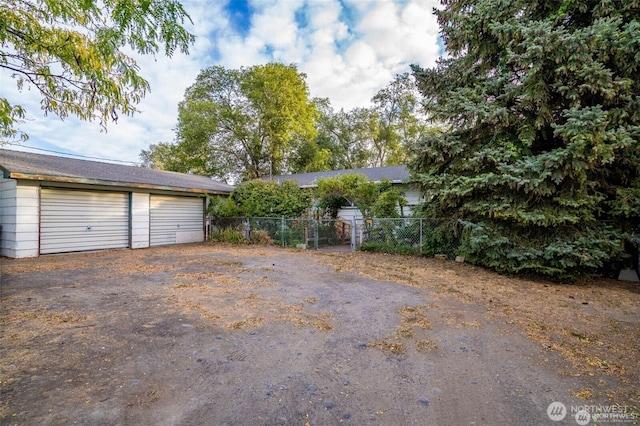 detached garage with fence