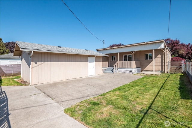 rear view of house featuring a lawn, a patio, fence, and a porch