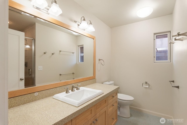 full bath featuring vanity, a shower stall, toilet, and visible vents
