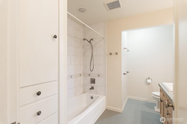 full bath featuring visible vents, vanity, toilet, baseboards, and bathtub / shower combination