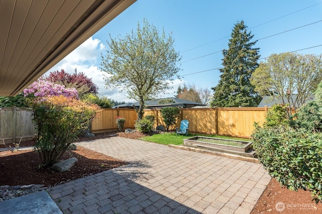view of patio with a fenced backyard