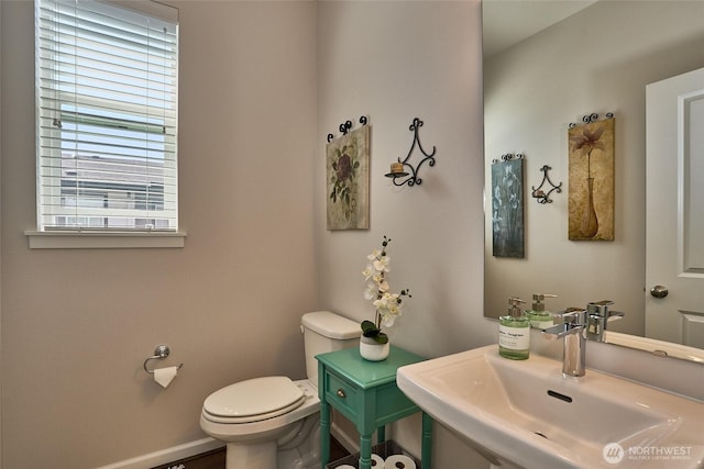 13146 83rd Ln S, Seattle, WA 98178 - half bath with baseboards, a sink, and toilet