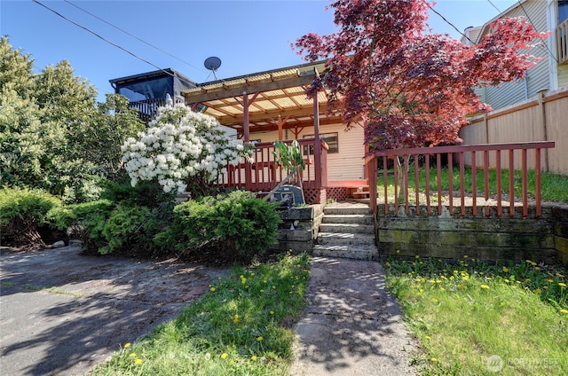 1917 E 60th St, Tacoma, WA 98404 - view of front of property featuring fence and a deck