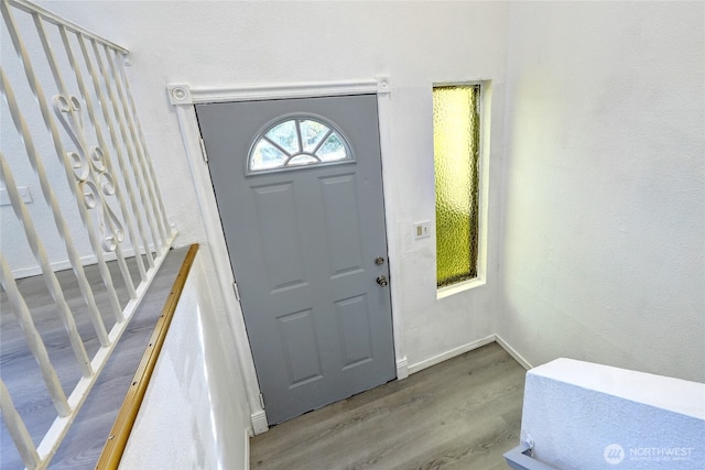 1917 E 60th St, Tacoma, WA 98404 - entrance foyer with baseboards and wood finished floors