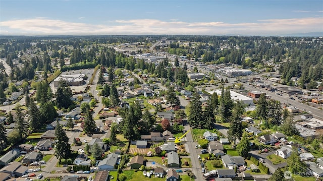aerial overview of property's location with nearby suburban area