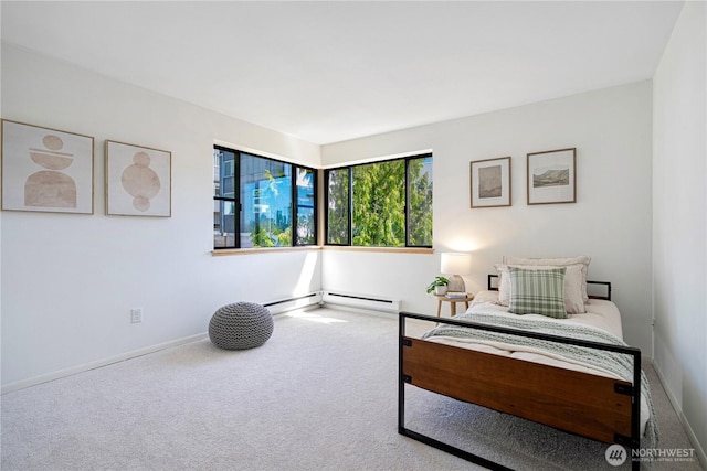912 3rd Ave W Unit 303, Seattle, WA 98119 - living area featuring baseboards, a baseboard radiator, and carpet floors