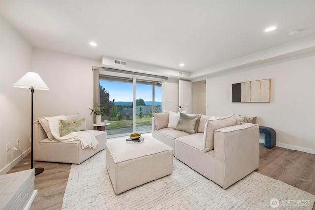6409 NW 202nd Cir, Ridgefield, WA 98642 - living room with wood finished floors, baseboards, and recessed lighting