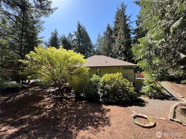 view of side of property with a deck