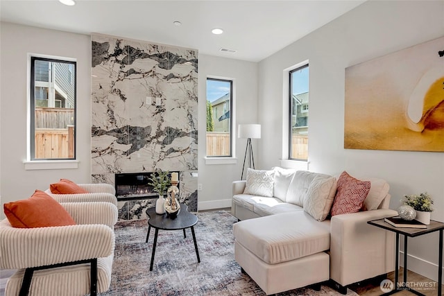 21403 39th Dr SE Unit B, Bothell, WA 98021 - living room with healthy amount of natural light, baseboards, recessed lighting, and a high end fireplace