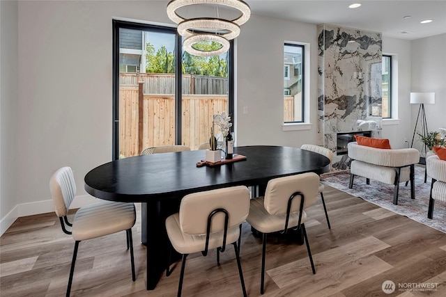 21403 39th Dr SE Unit B, Bothell, WA 98021 - dining room featuring wood finished floors, recessed lighting, a chandelier, and baseboards