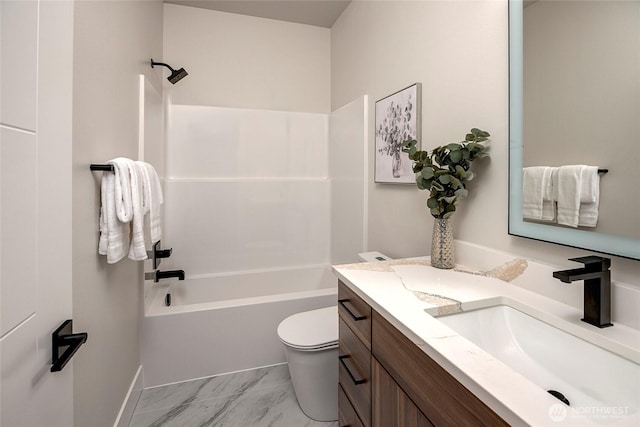 21403 39th Dr SE Unit B, Bothell, WA 98021 - bathroom featuring vanity, washtub / shower combination, toilet, marble look tiles, and baseboards
