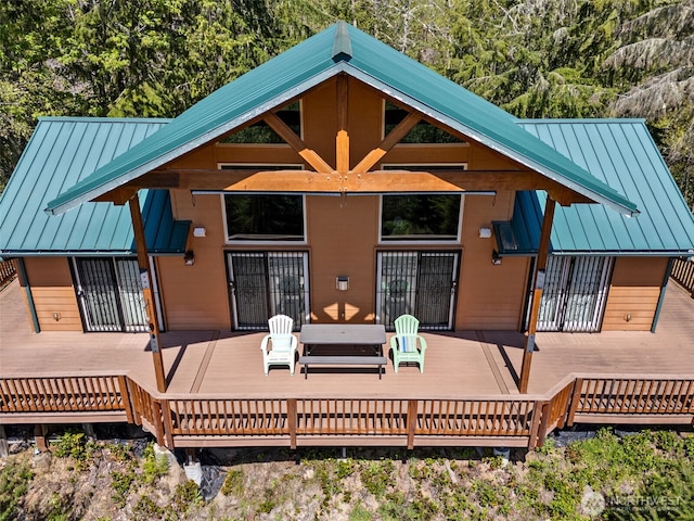 0 Boyd Rd, White Pass, WA 98377 - back of house featuring a standing seam roof, a deck, and metal roof