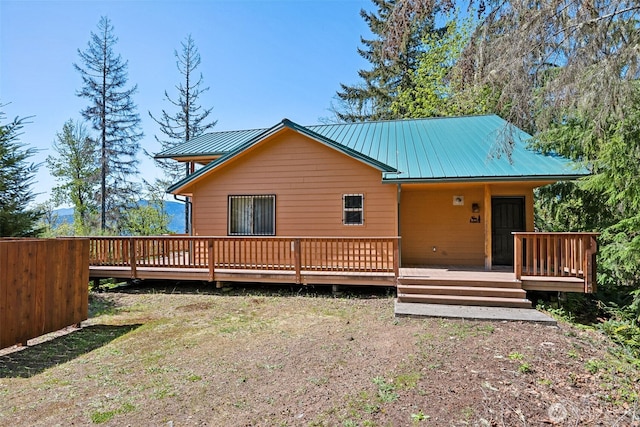 0 Boyd Rd, White Pass, WA 98377 - rear view of house with a standing seam roof, a deck, and metal roof