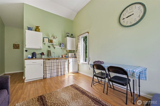 0 Boyd Rd, White Pass, WA 98377 - interior space featuring baseboards, light wood finished floors, and lofted ceiling