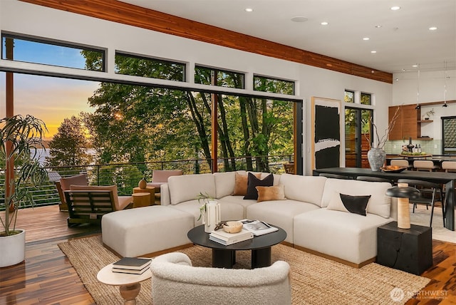 interior space with wood finished floors, plenty of natural light, and recessed lighting