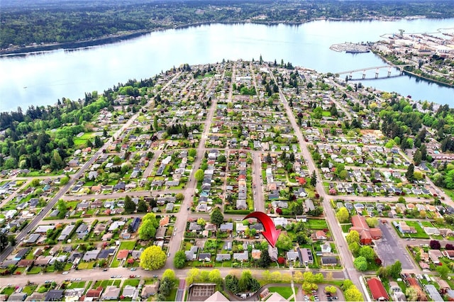 birds eye view of property featuring a water view